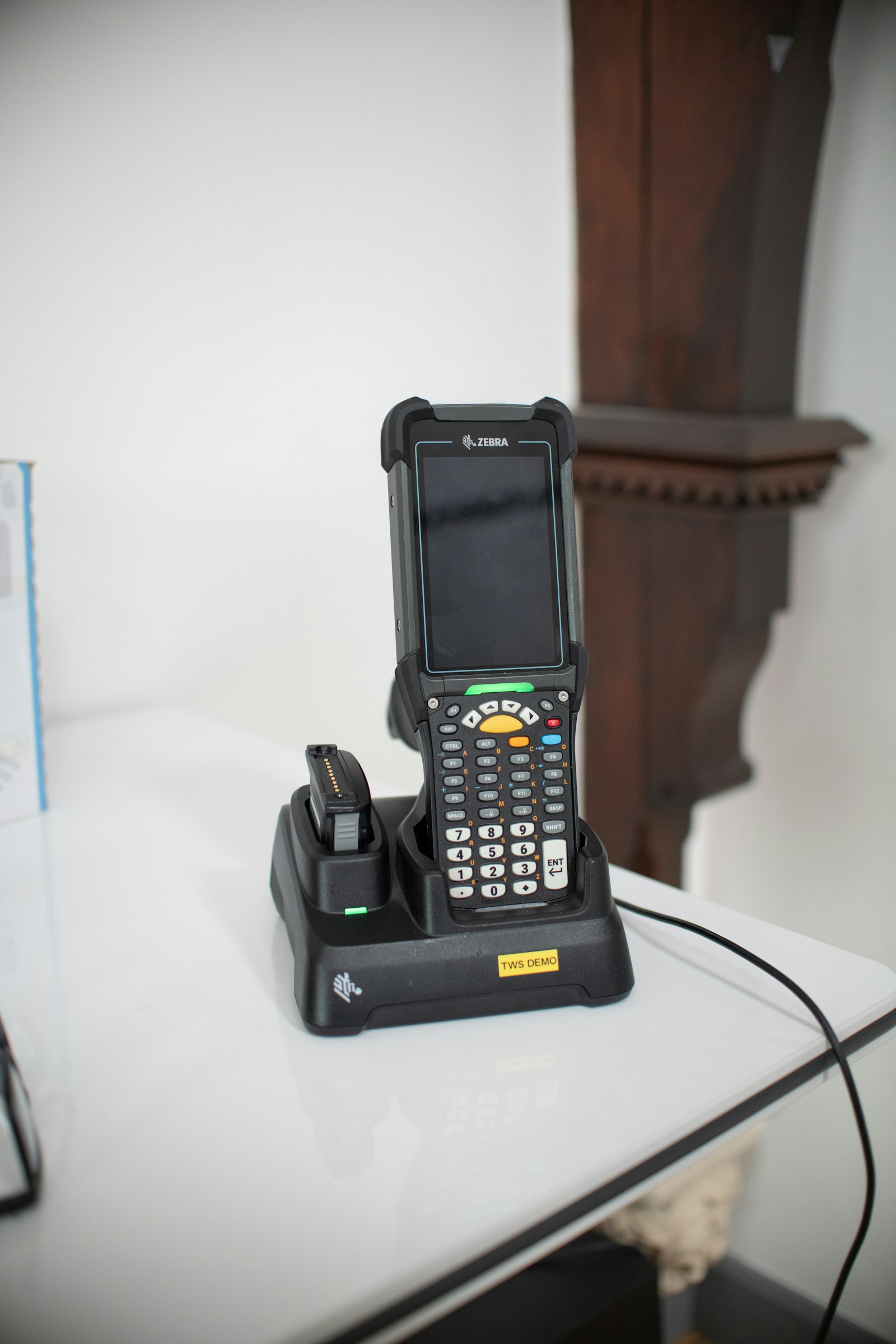 Speedizon operations associate scanning inventory at a pick station